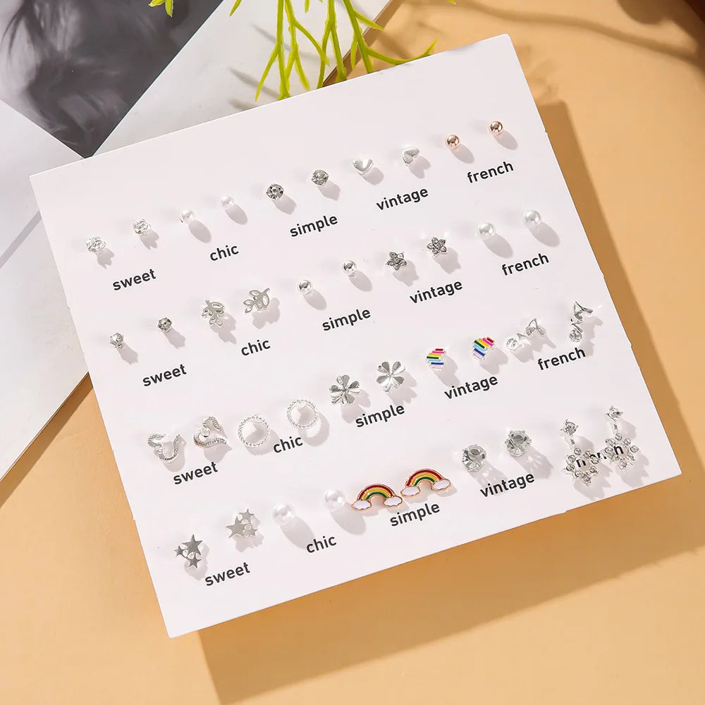 White Pearl Stud Earrings — Swuffy