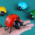 Tiny Iron Metal Ladybug Wall — Swuffy
