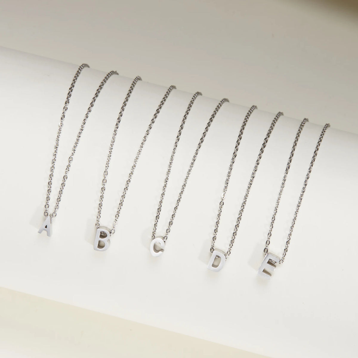 Silver Tiny Initial Letter Necklace — Swuffy