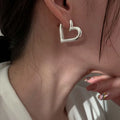 Sterling Silver Heart Hoop Earrings — Swuffy