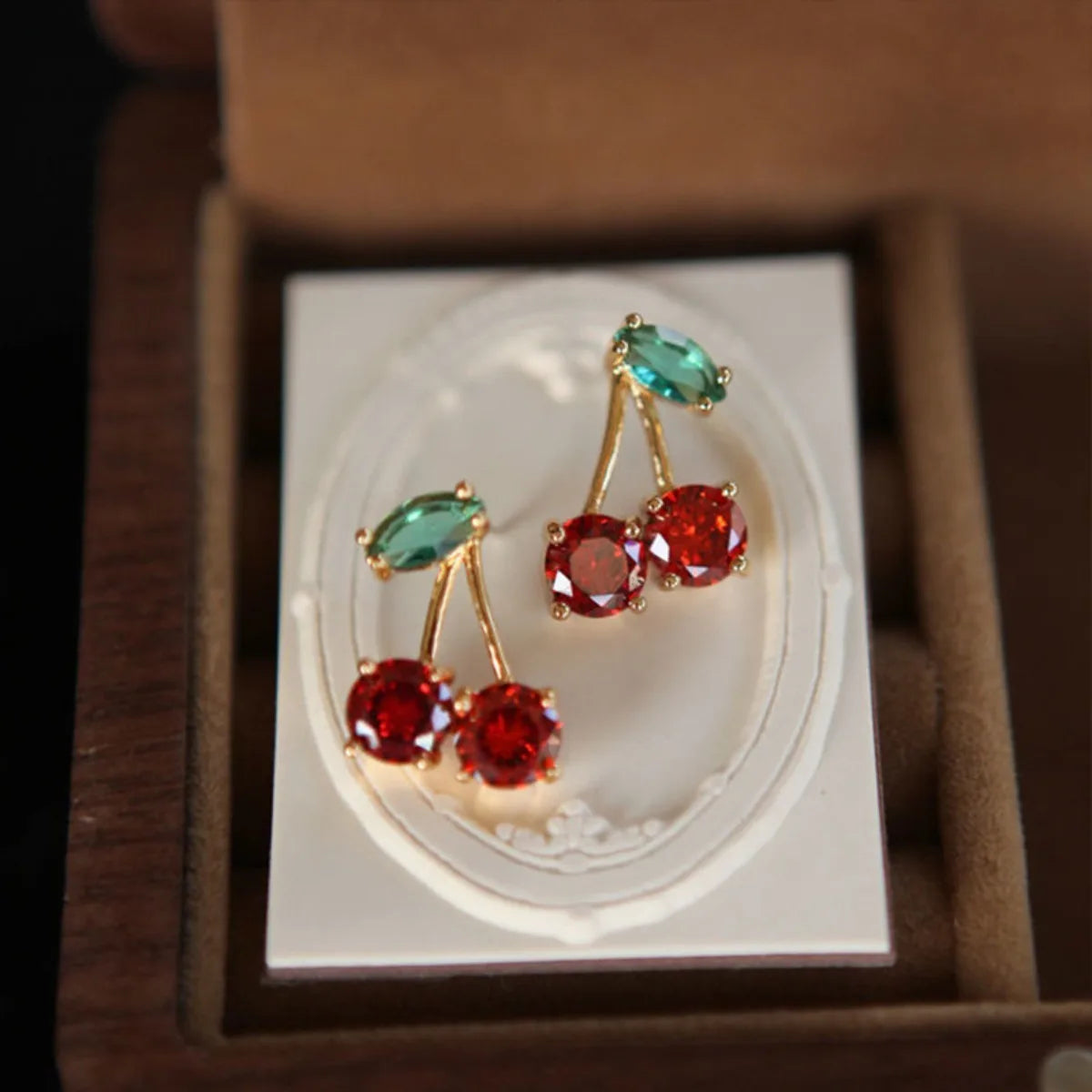 Red Zircon Cherry Leaf Stud — Swuffy