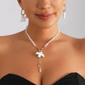 Pearl Dove Drop Earrings — Swuffy