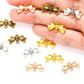 Antique Silver Metal Bow Charms — Swuffy